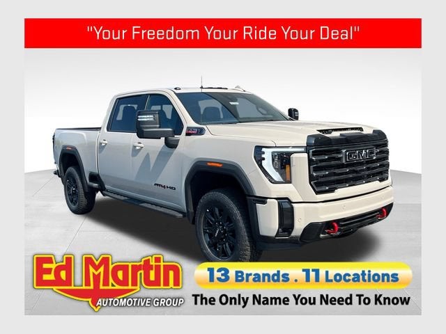 2026 GMC Sierra 2500 HD AT4 in Coastal Dune — front three-quarter view