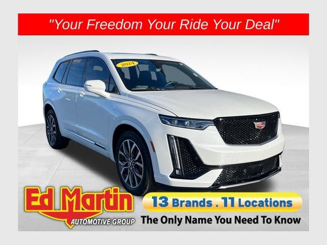 2024 Cadillac XT6 Sport in Crystal White Tricoat — front three-quarter view