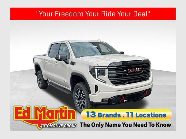 2026 GMC Sierra 1500 AT4 in Coastal Dune — front three-quarter view